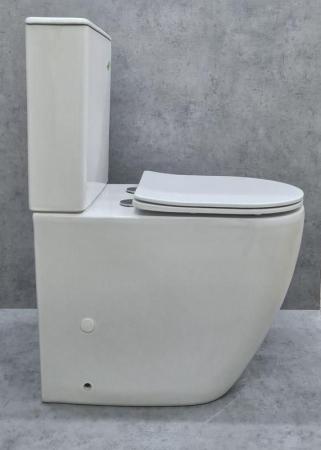 Унитаз Ceramalux 1289A напольный безбодковый с бачком ( GEBERIT ) сиденье микролифт, белый