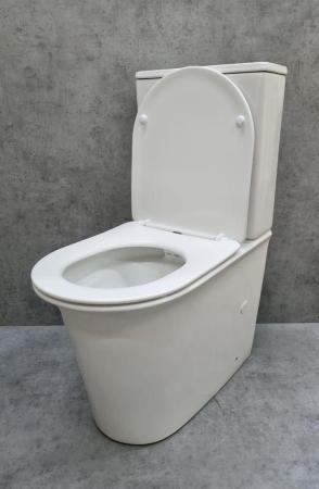 Унитаз Ceramalux 1223A напольный безбодковый с бачком ( GEBERIT ) сиденье микролифт, белый
