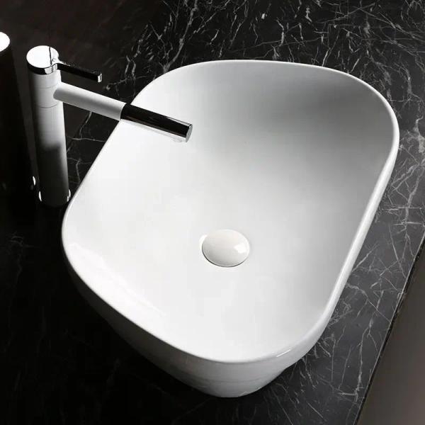 Раковина Cerutti SPA CR0023 накладная, белая, трапеция 570х390х150